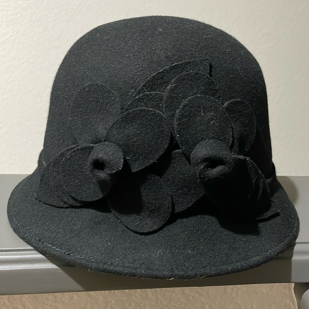 Nine West. Super cute black hat with flower cut out detailing. One size